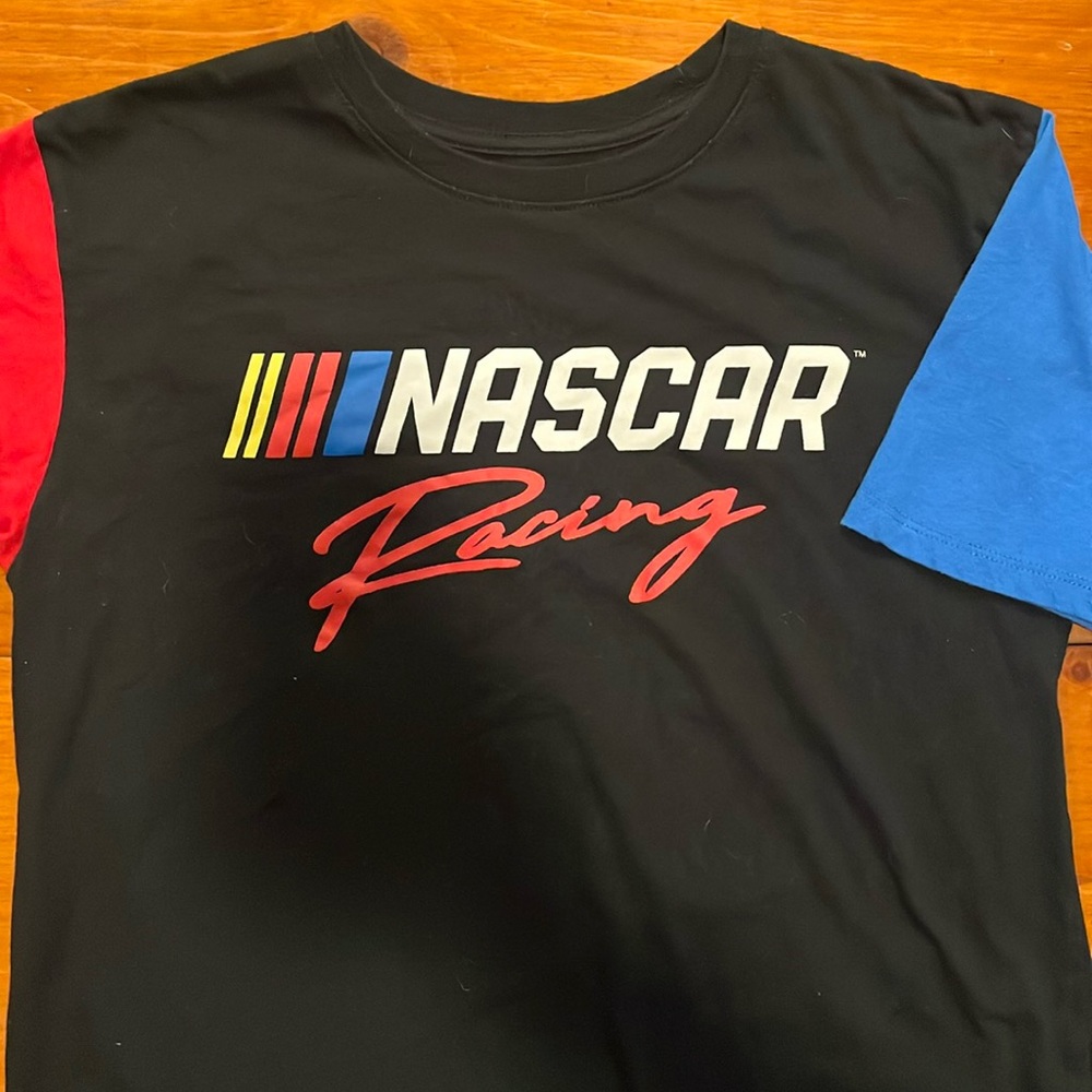 NASCAR shirt. Size large, but fits more like medium.